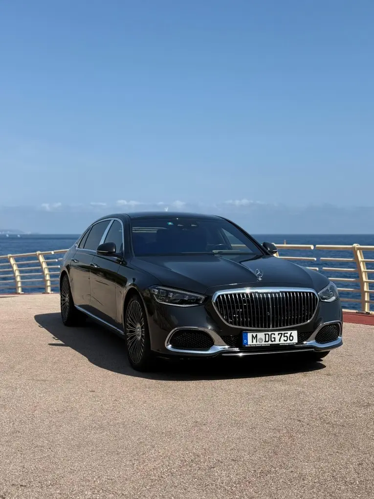 Maybach S580 2023, rear view — Luxury Car France, France. Quiet arrivals at the hotel entrance, chauffeur ready